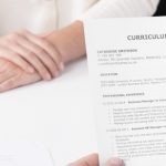 Curriculum vitae hold by a recruiter