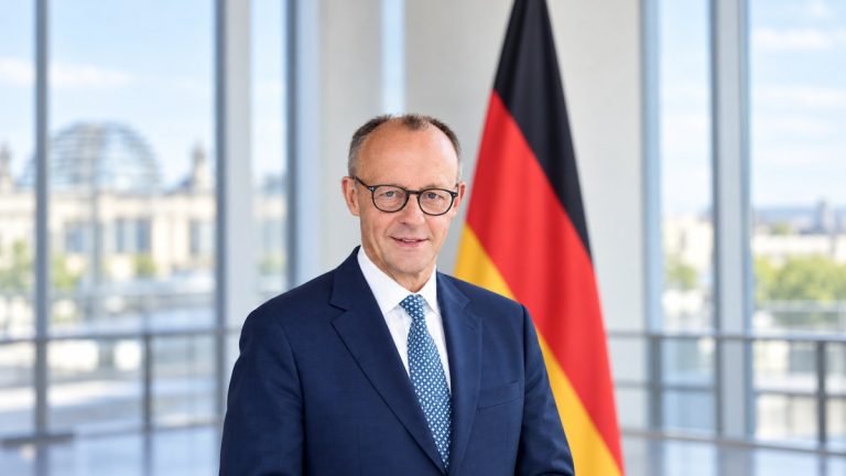 Ilustracja AI: Friedrich Merz na tle flagi Niemiec