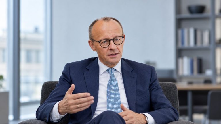 Friedrich Merz podczas symbolicznej rozmowy. Ilustracja AI.