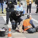 Protestujący aktywista klimatyczny w Berlinie