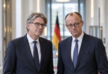 Minister Merza żąda od SPD zablokowania koalicji z Lewicą w Berlinie! Ilustracja AI: Wolfram Weimer i Friedrich Merz w budynku rządowym